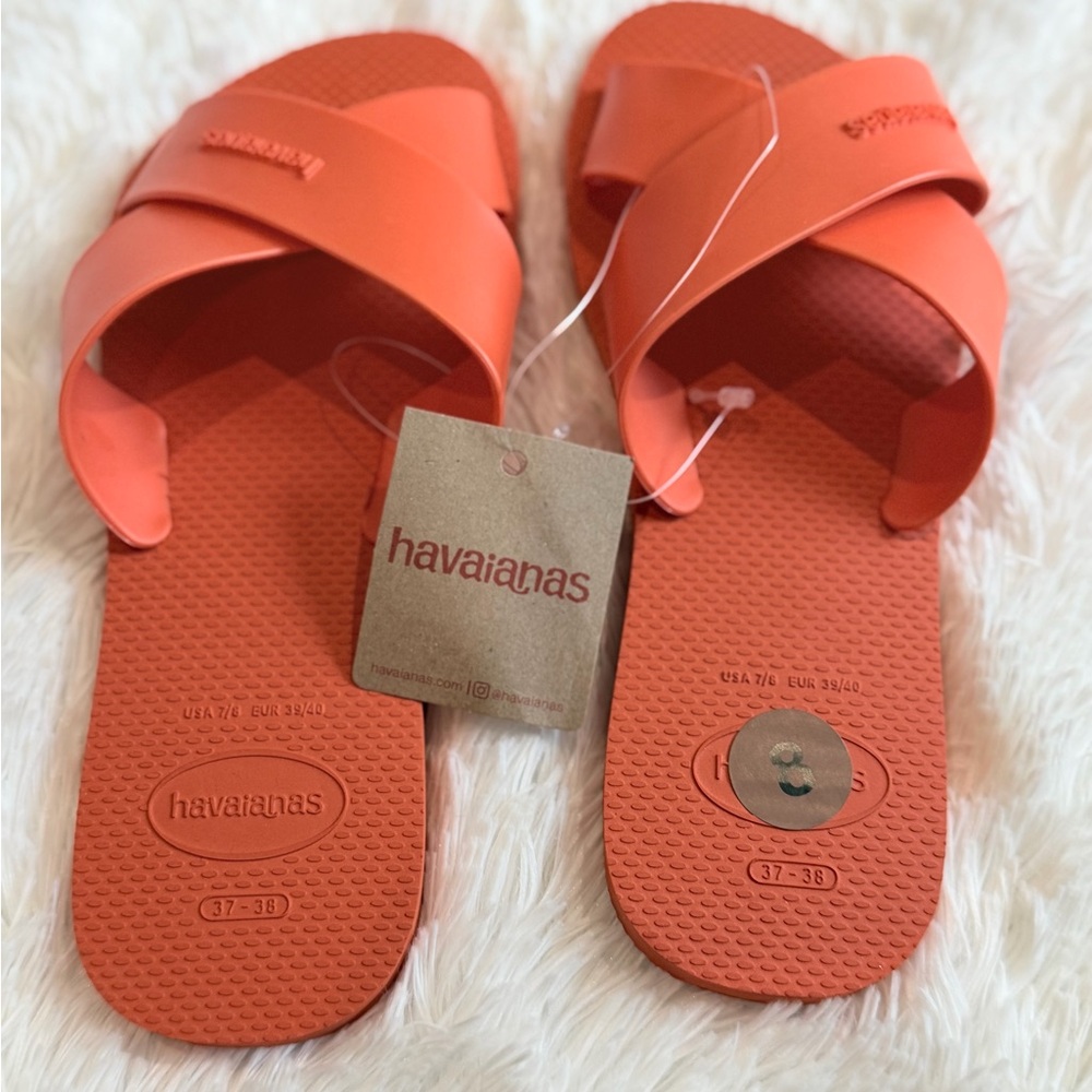 Havaianas Aqua Sandals in the color Sunset Orange.